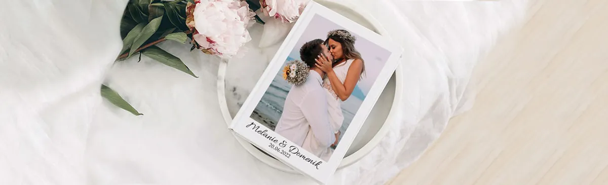 Personalisiere ein Fotobuch als Geschenk zur Hochzeit